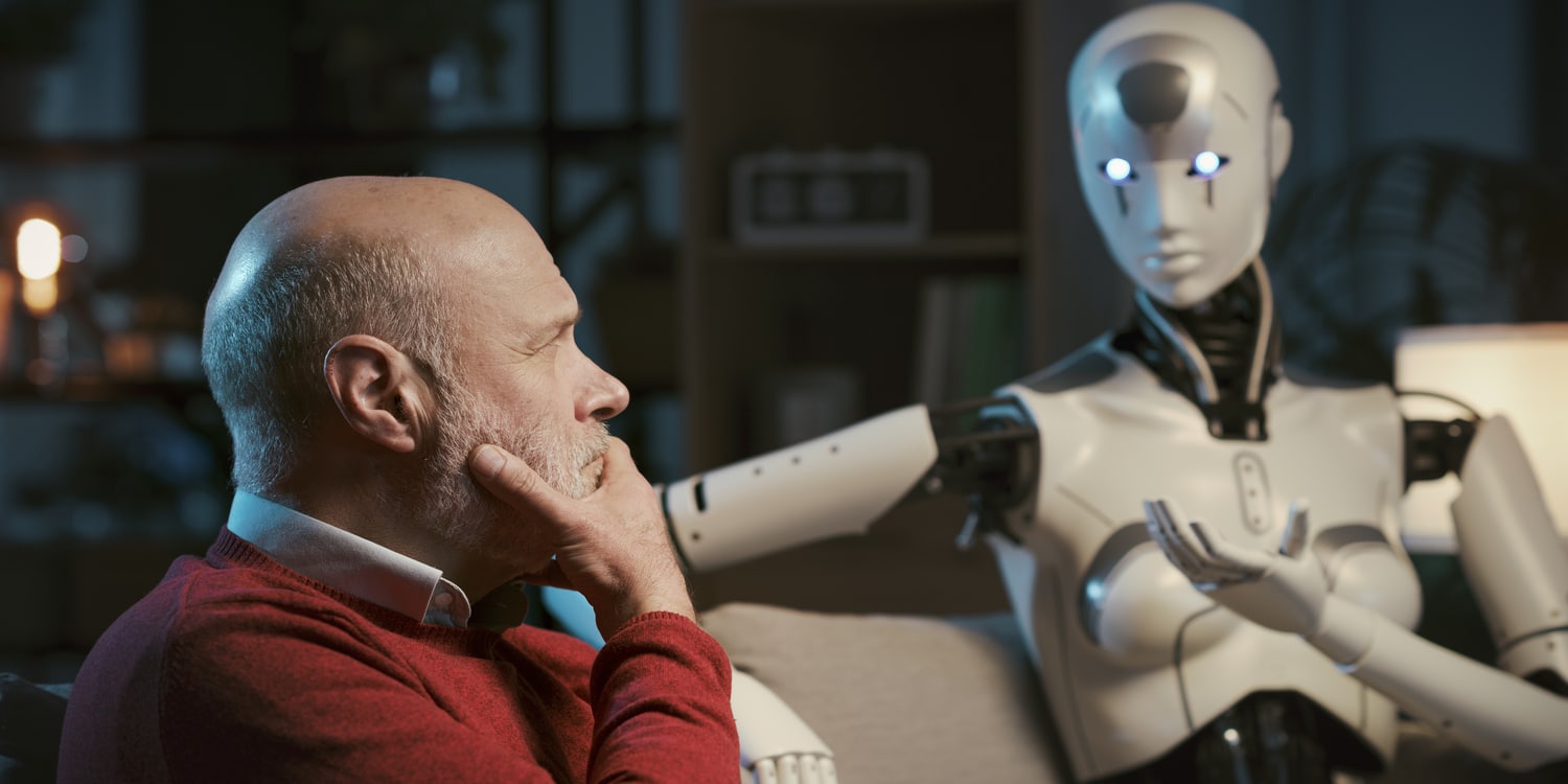 vecchio perplesso scruta robot