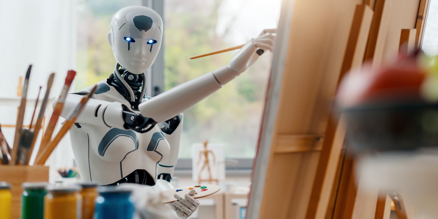 robot ai ci guarda mentre dipinge grafici
