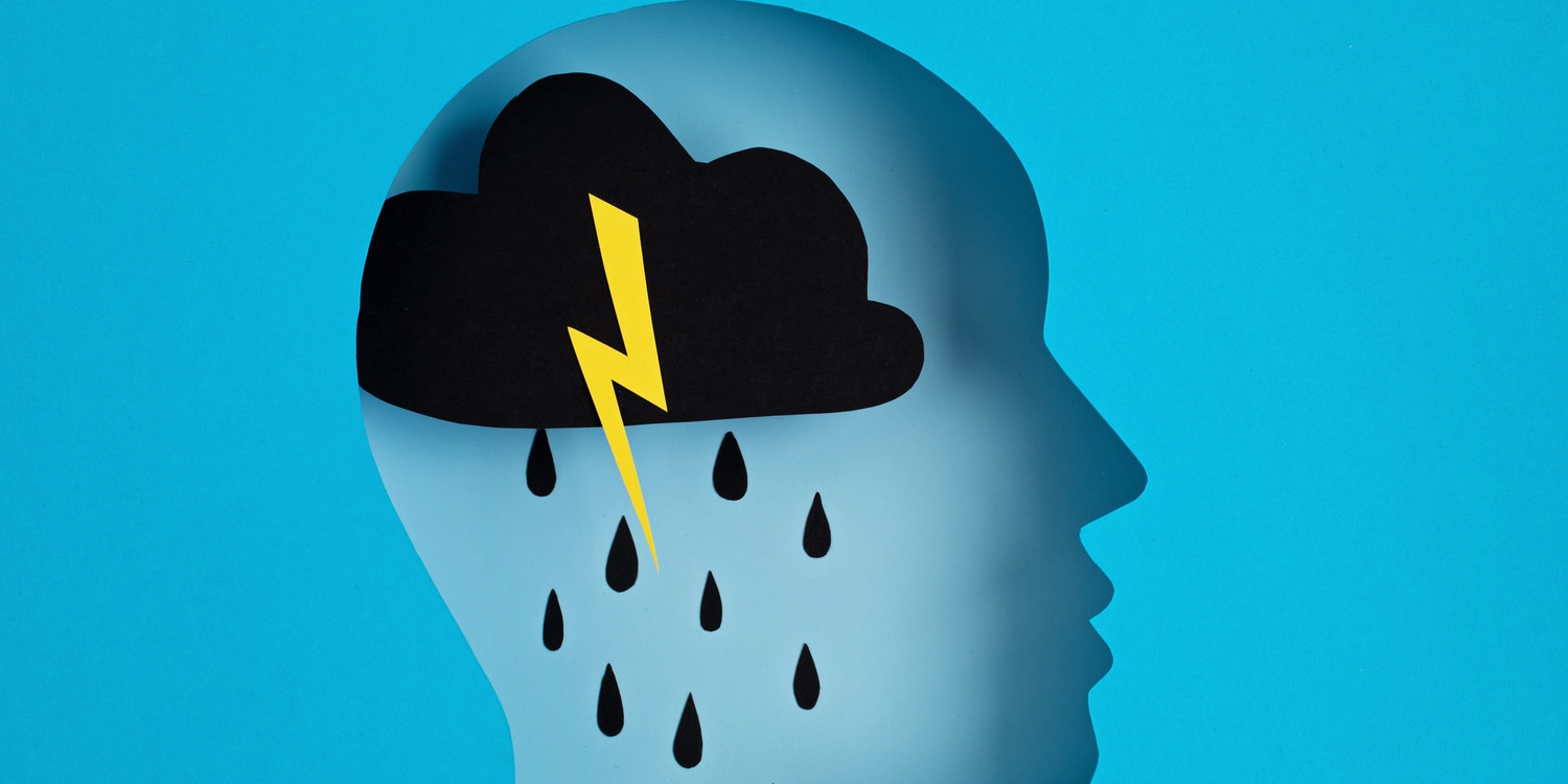 testa stilizzata con temporale per via di burnout